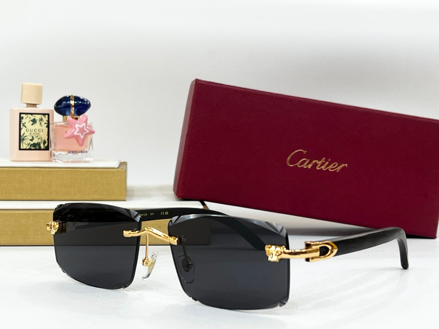 C DE RIMLESS RECTANGULAR FRAME SUNGLASSES CT0612S IN METAL